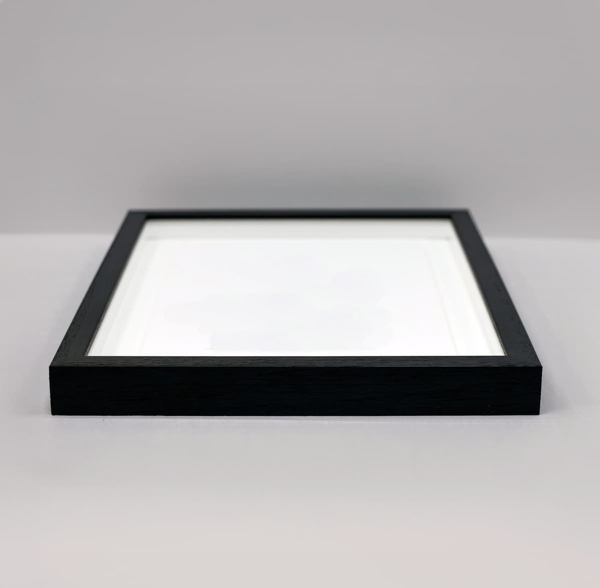 Framed artwork highlighting quality